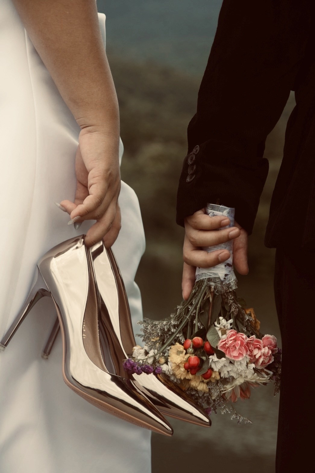 Engagement shoes and bouquet held by Vicko and Namthip